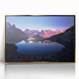 Acrylic print of the French Alps in muted earth tones, framed in gold, suitable as modern art wall decor for a nursery.