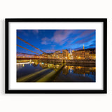 Abstract art print of Lyon scenery in vibrant colors on a textured canvas, framed in black, ideal for living room decor.