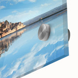 Large abstract wall art depicting a mid-century modernist scene of a European cityscape in muted gray and blue tones.