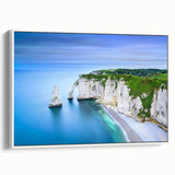 Vintage poster art of a Normandy landscape in a white framed canvas, featuring colorful art on a black background.