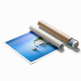 Extra large rolled print depicting a serene Normandy landscape with vibrant green fields and a calm blue sky.