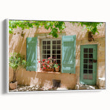 Vintage poster art of a scenic French village in vibrant colors on a large framed canvas, ideal for living room decor.