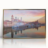 Acrylic print of a Bavarian landscape in muted greens and blues, framed in gold.