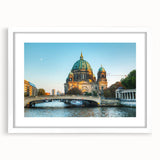 Textured abstract art print of Berlin cityscape in muted earth tones on a framed white mat, ideal for bedroom art.