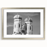 Extra large abstract art print depicting a textured Munich scenery in muted earth tones, framed in silver.