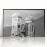 Mid-century modernist art of Munich skyline with muted blue and gray tones on a silver-framed acrylic print.