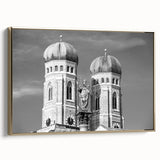 Framed canvas featuring a vintage-style landscape painting of Munich with muted gold and black tones.