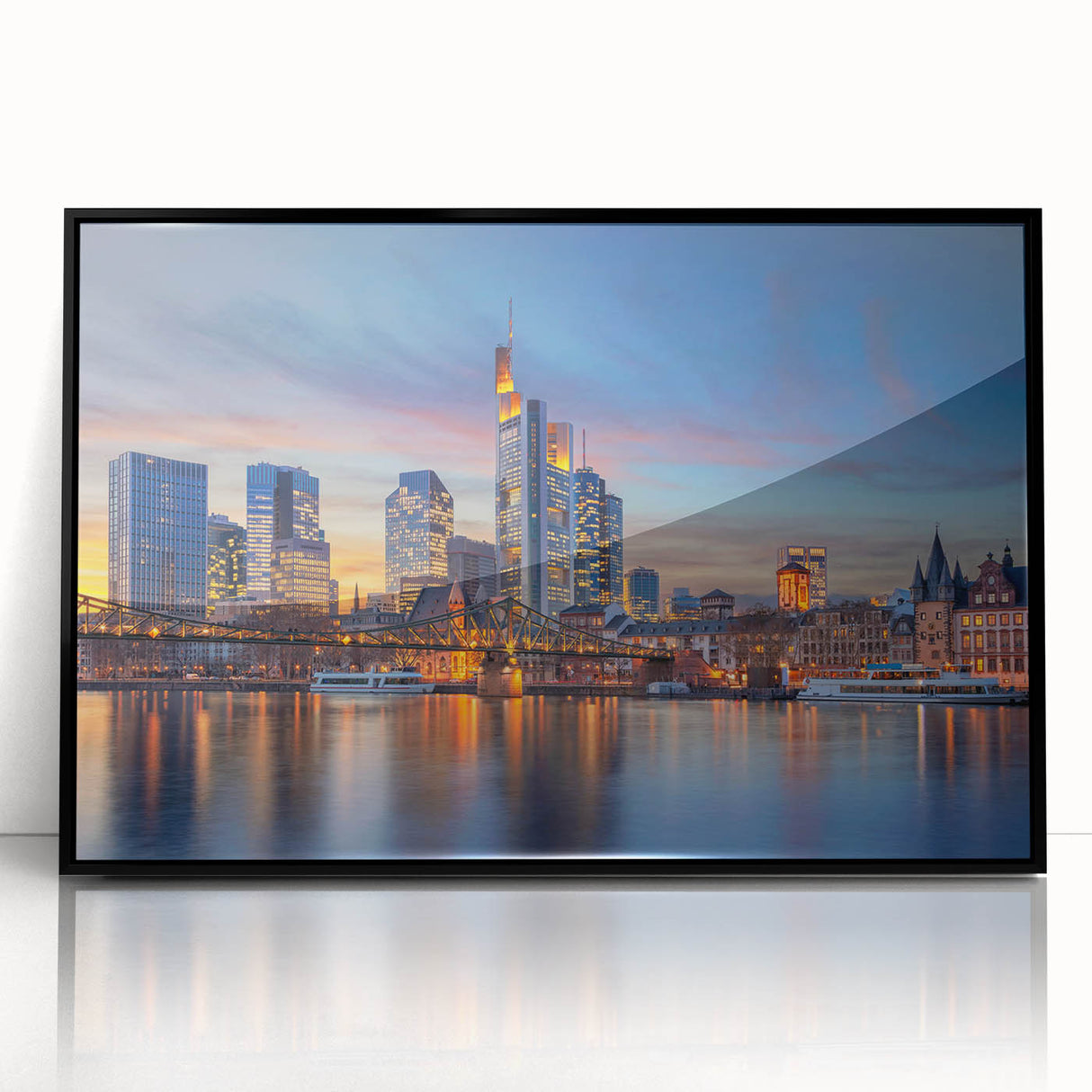 Large abstract wall art depicting a European cityscape in muted gray tones, framed in black acrylic.