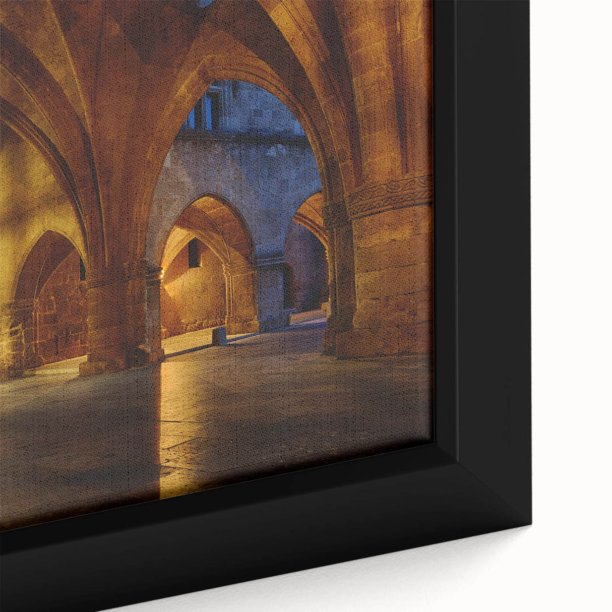 Close-up of black wall art featuring a textured European scenery in vibrant colors on a framed canvas.