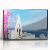 Acrylic print of Santorini landscape with blue and white tones, framed in silver, suited for modern art wall decor.