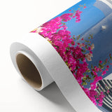 Art Deco-style poster of Santorini landscape on rolled canvas, featuring bright blue and white tones.