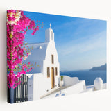 Stretched canvas depicting the Santorini skyline in vibrant blue and white tones, suitable for kitchen wall art.