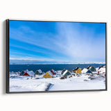 Black and white wall art featuring a vintage poster style landscape of Greenland on a framed canvas.