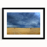 Abstract art print featuring colorful, textured scenery of a European landscape on a large framed canvas.