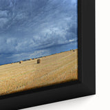 Framed canvas depicting a textured, colorful European cityscape with black borders, ideal for large living room walls.