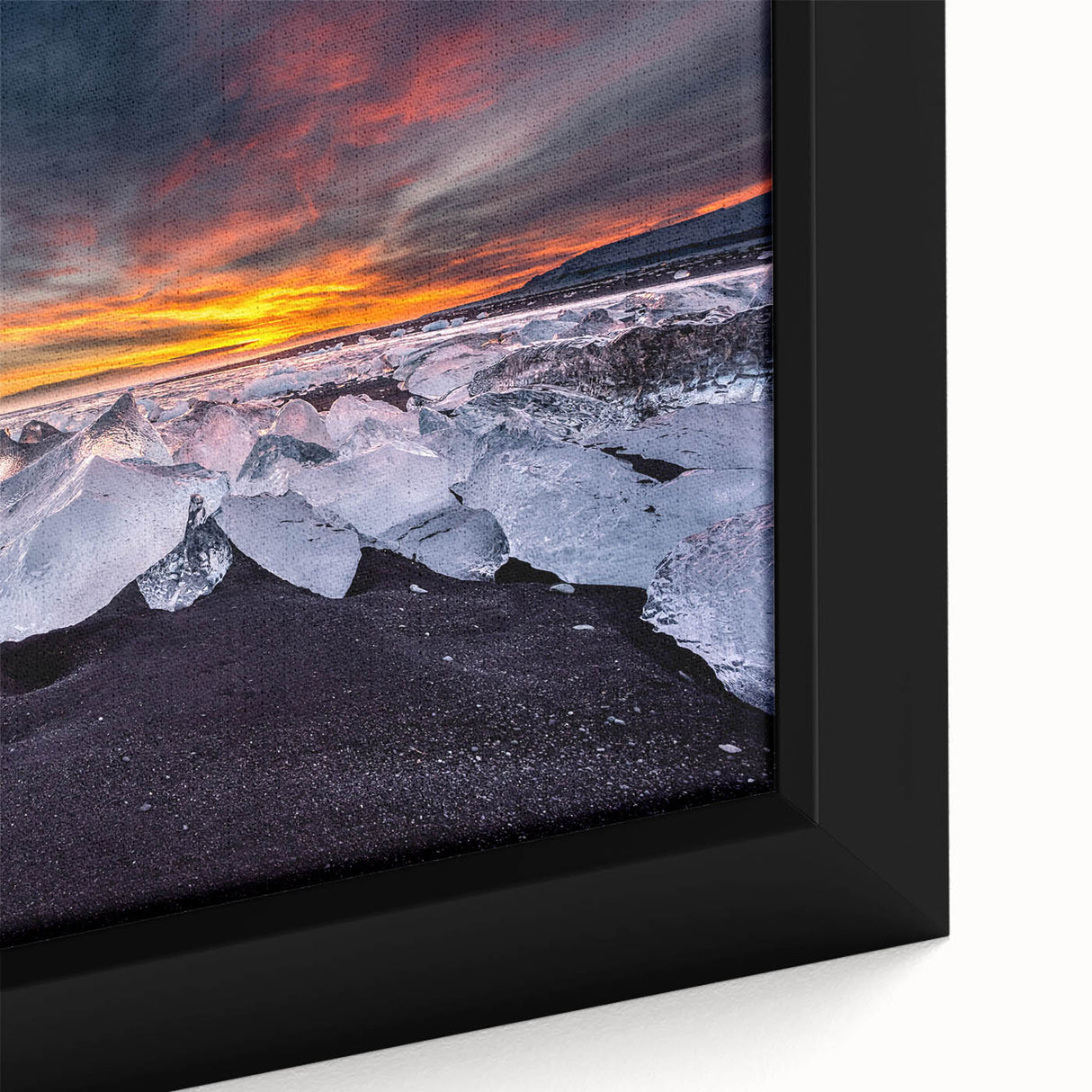 Framed canvas featuring a textured, black scenery of Iceland with colorful accents, ideal for living room decor.
