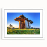 Textured art print of an abstract Irish landscape in muted green and blue tones, framed in white, ideal for bedroom art.