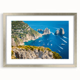 Extra large abstract art print of Capri, Italy, in textured shades of blue and white, framed in silver.