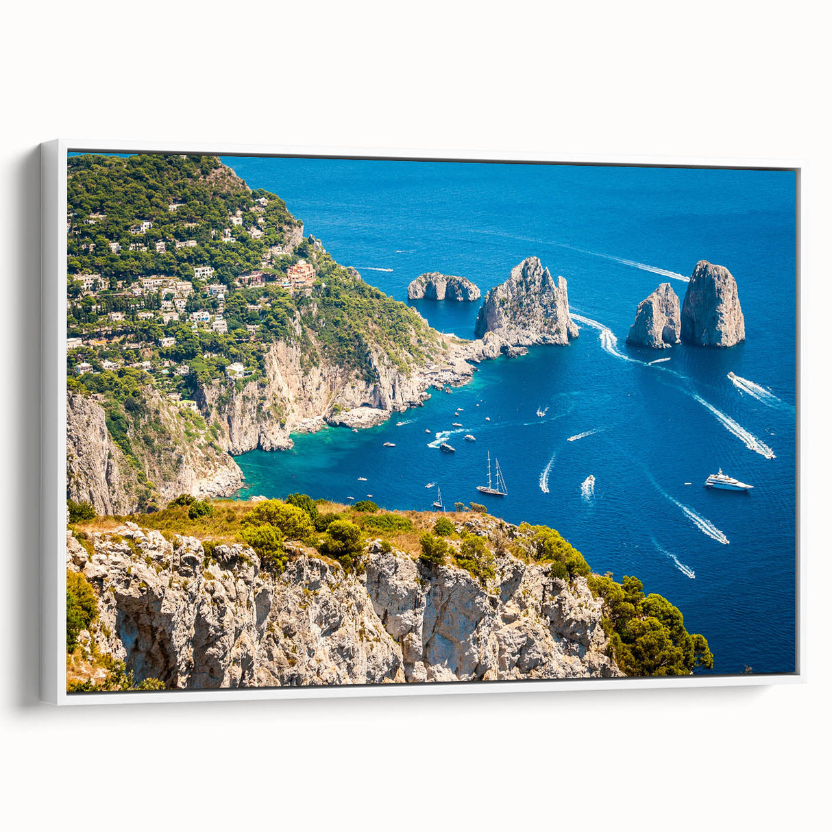 Vintage poster art of Capri, Italy on framed canvas, featuring vibrant colors against a black background.
