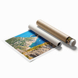 Rolled print of Capri, Italy scenery with vibrant ocean blues and cliffside florals, ideal for classy bathroom wall art.