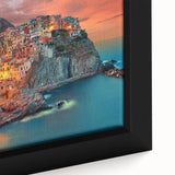 Framed canvas of Cinque Terre with textured, colorful art on black background, ideal for living room decor.