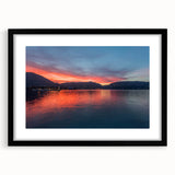Extra large abstract art print of Lake Como with vibrant colors on a textured canvas, framed in black.