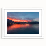 Textured art print of Lake Como with abstract elements and a muted color palette on a framed white mat.