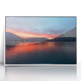 Mid-century modernist art depicting Lake Como with soft blue and green tones on a white framed acrylic.