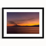 Extra large abstract art print of Mount Etna with textured, colorful strokes on a black framed canvas.