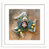 Textured abstract art print depicting a Sicilian landscape in earthy tones on a framed white mat, ideal for bedroom decor.