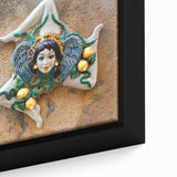 Framed canvas of a Sicilian landscape in textured black with colorful accents, ideal for living room decor.