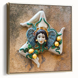 Framed canvas wall art depicting a Sicilian landscape in silver and gold tones, ideal for bedroom decor.