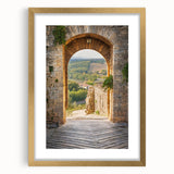 Abstract art print of Tuscany landscape in muted earth tones, framed in gold, suitable for dining room decor.