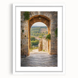 Textured art print of abstract Tuscan landscape in earth tones on a framed white mat, ideal for bedroom decor.