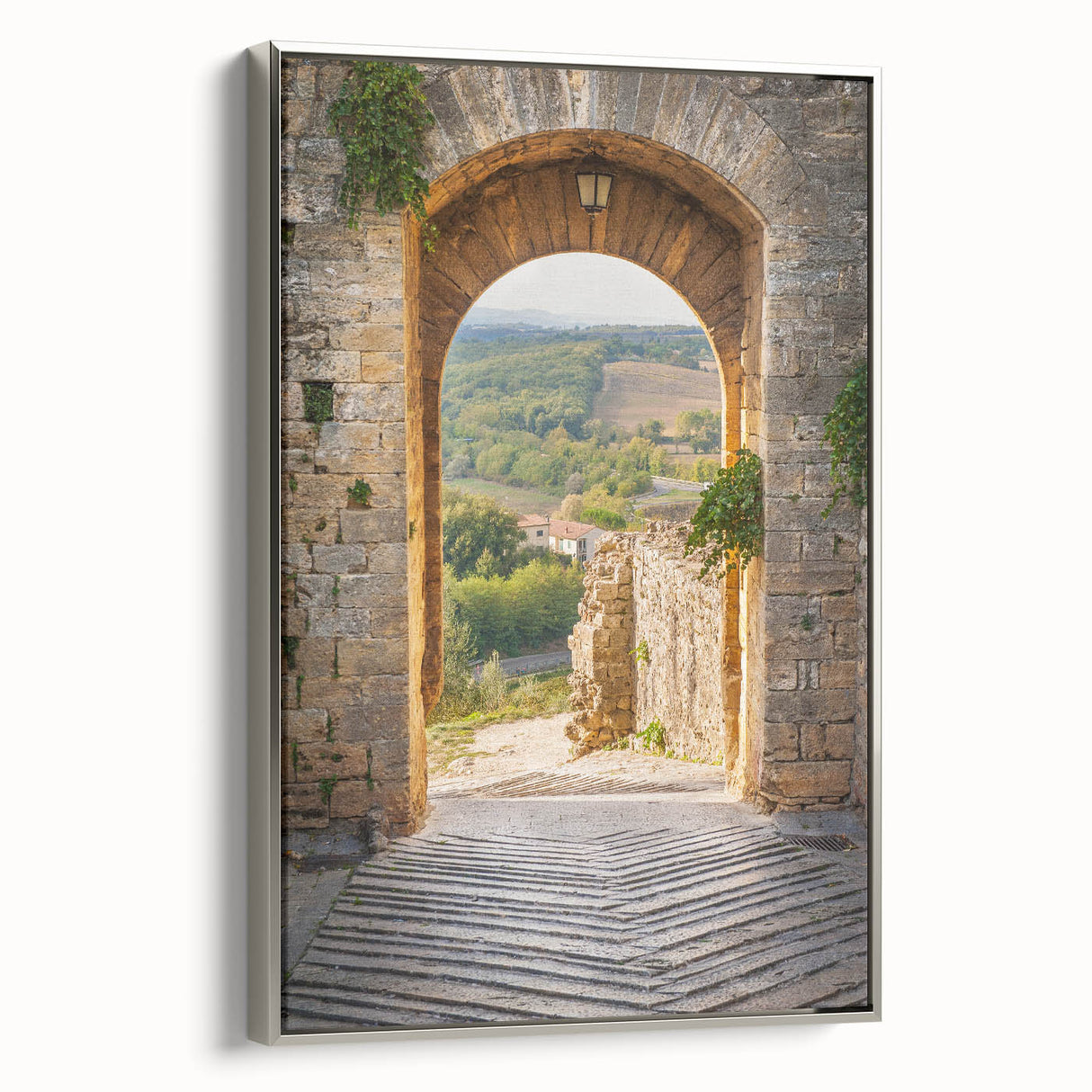 Framed canvas landscape art painting depicting a colorful Tuscan scenery in muted earth tones.