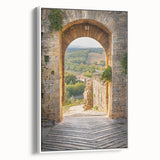 Framed canvas featuring a vintage poster art of Tuscany landscape with colorful art on a black background.