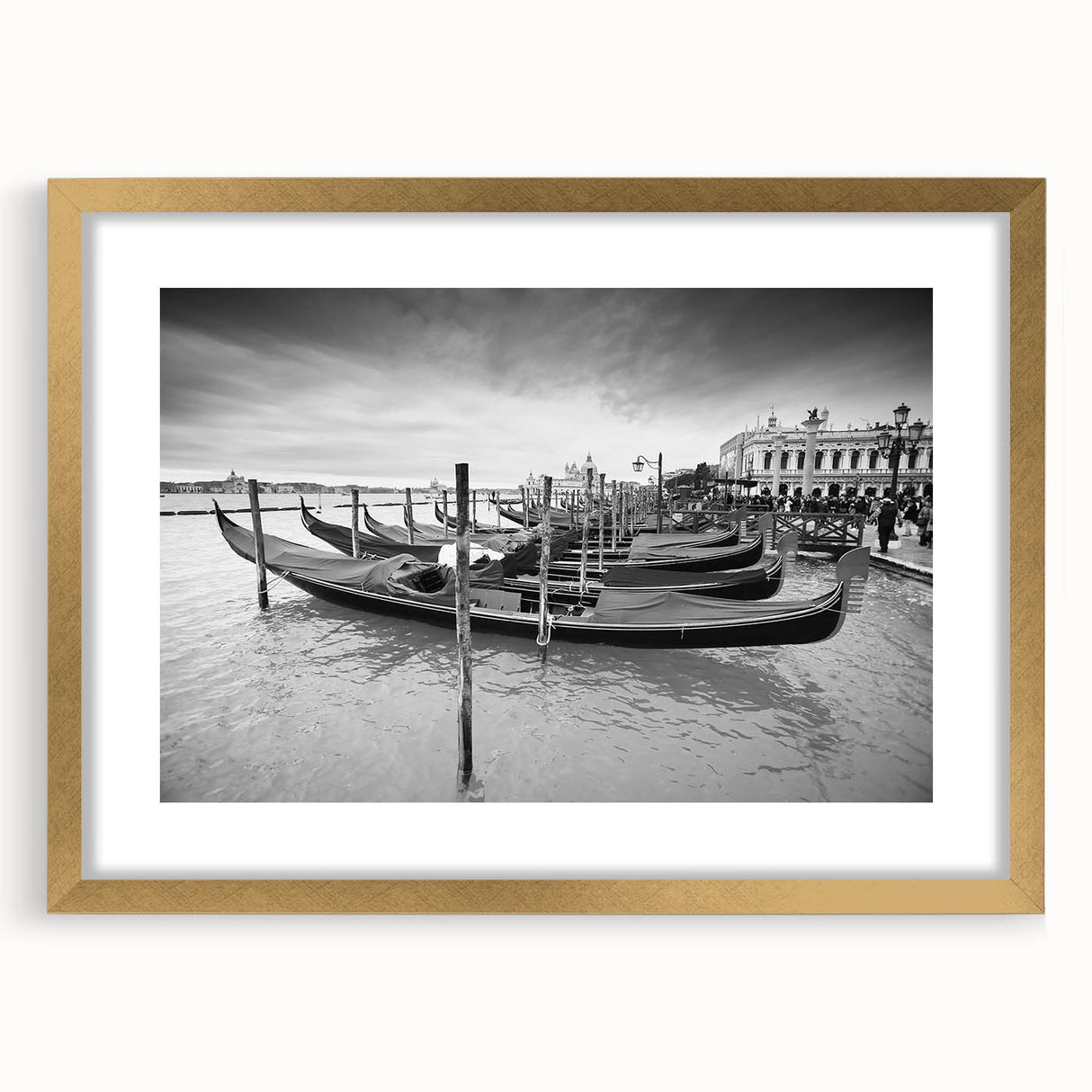Abstract art print of Venice scenery in muted gold and blue tones on a framed canvas, suitable for dining room decor.