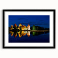 Abstract art print depicting a vibrant, colorful European scenery on textured canvas, framed in black.