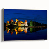 Framed canvas of a vintage-style landscape painting depicting a Lithuanian scenery in muted earth tones.