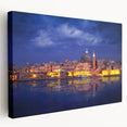Large stretched canvas depicting a scenic view of Malta in vibrant blue and orange tones, ideal for kitchen wall art.