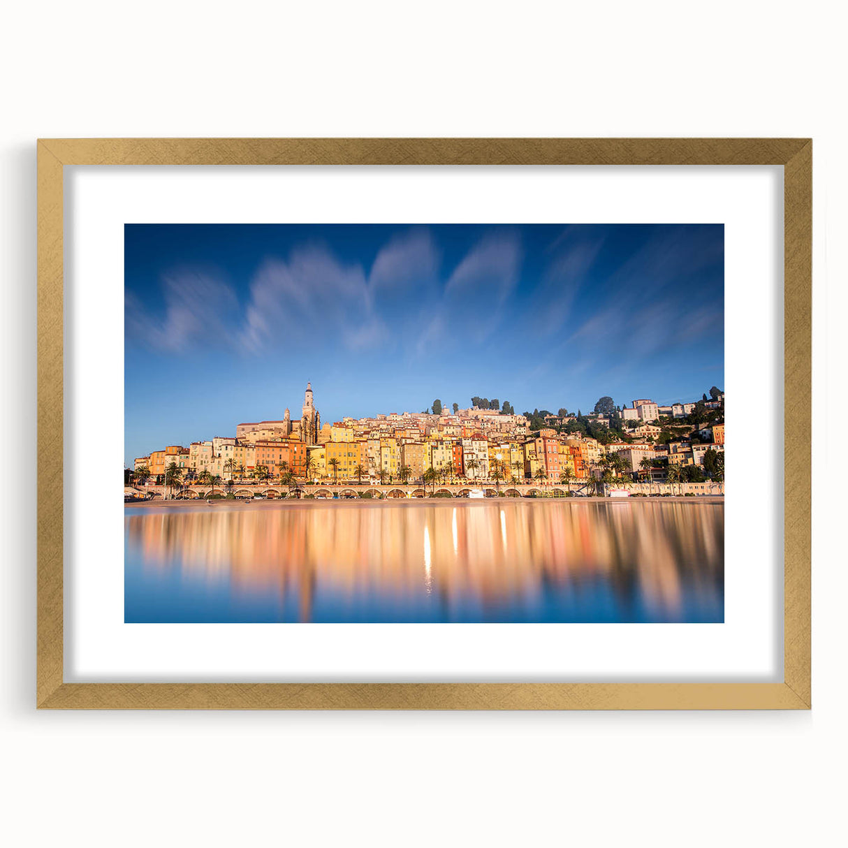 Abstract art print of Monaco scenery in muted gold and blue tones on a framed mat, suitable for dining room decor.
