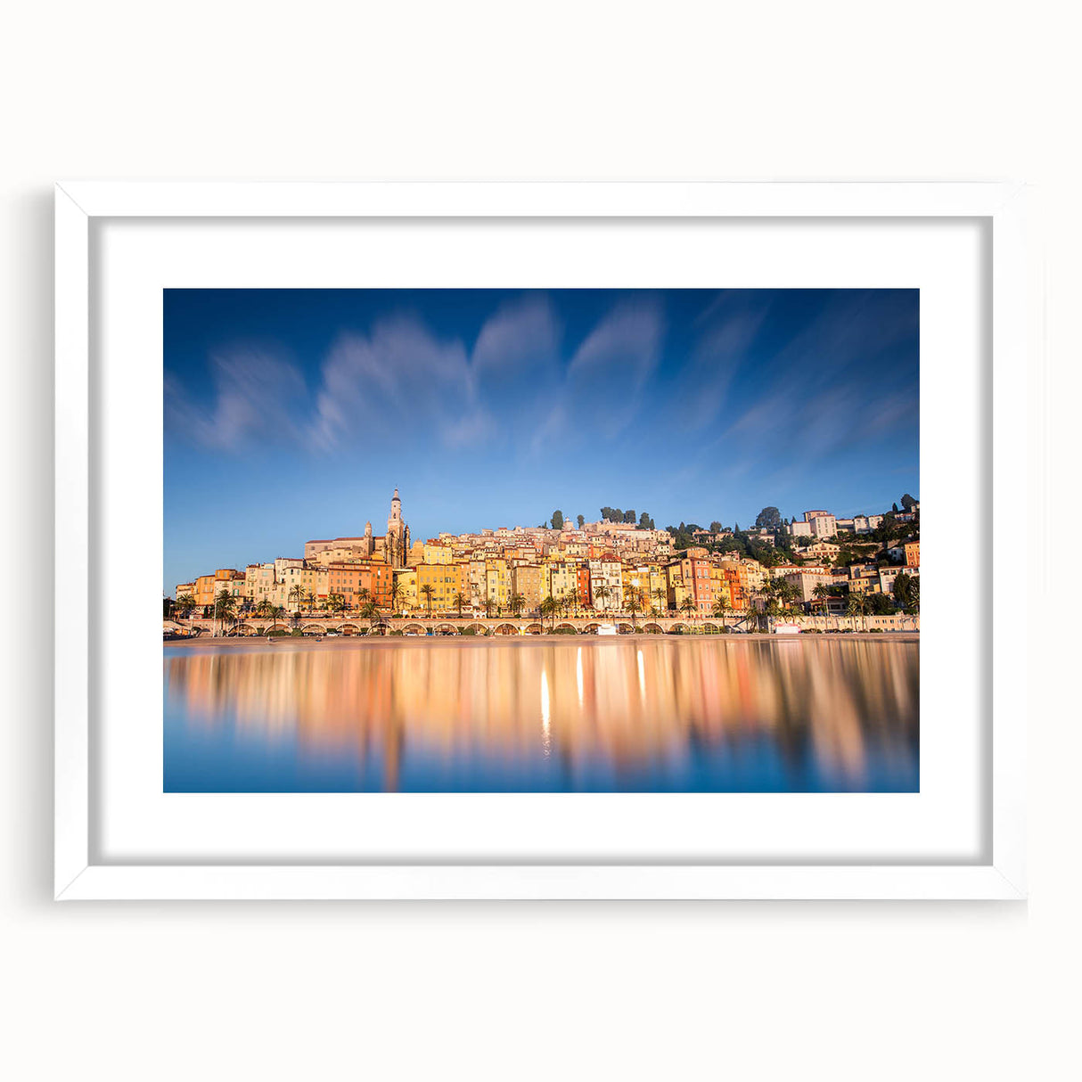 Textured abstract art print of Monaco scenery in muted blue and white tones, framed with a white mat.