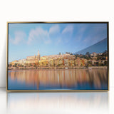 Art deco poster of Monaco scenery with gold frame, acrylic print, featuring pastel blue and pink tones.