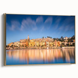 Framed canvas of a vintage-style Monaco landscape in muted gold and black tones, ideal for bedroom wall decor.