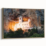 Framed canvas featuring a vintage-style landscape painting of Montenegro, with muted earth tones, ideal for bedroom wall art.