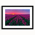 Colorful abstract art print of a European scenery in vibrant hues on a large textured canvas, framed in black.
