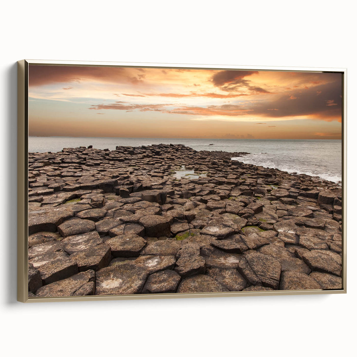Framed canvas wall art depicting a vintage-style landscape of Northern Ireland, featuring muted earth tones.