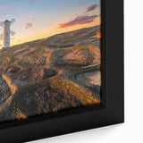 Close-up of a framed canvas featuring a textured, colorful European scenery in black, ideal for living room decor.