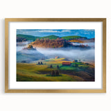 Abstract art print of a European landscape in muted earth tones on a gold-framed canvas, suitable for dining room decor.