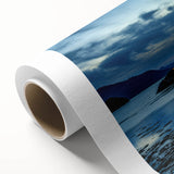 Art Deco poster of a serene Scottish landscape on rolled canvas, using soft green and blue tones, ideal for nursery wall art.